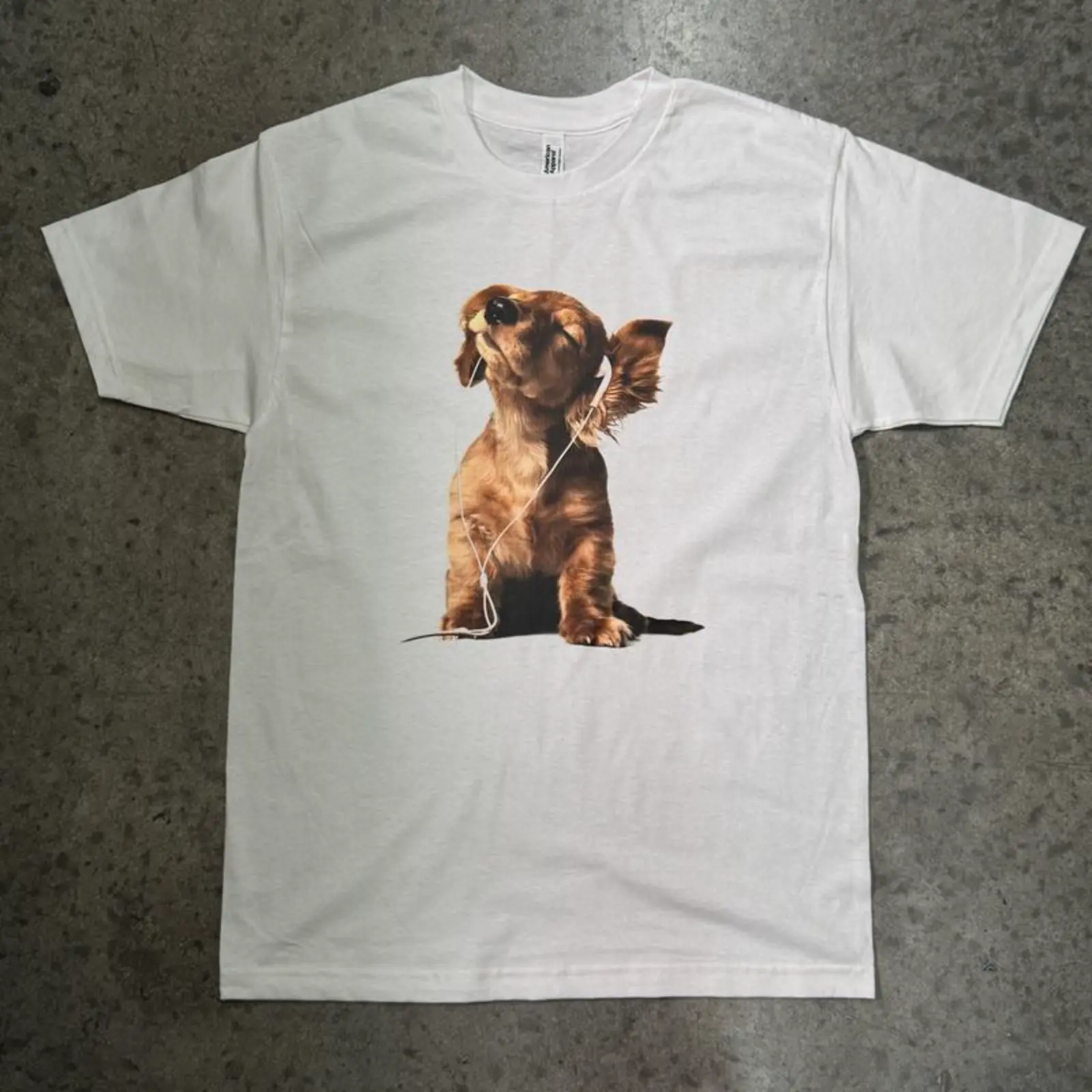 Funny Dog With Headphones Graphic Tee, Cute Puppy Listening to Music Cartoon Design Athletic Cut Casual Streetwear Unisex White T-Shirt